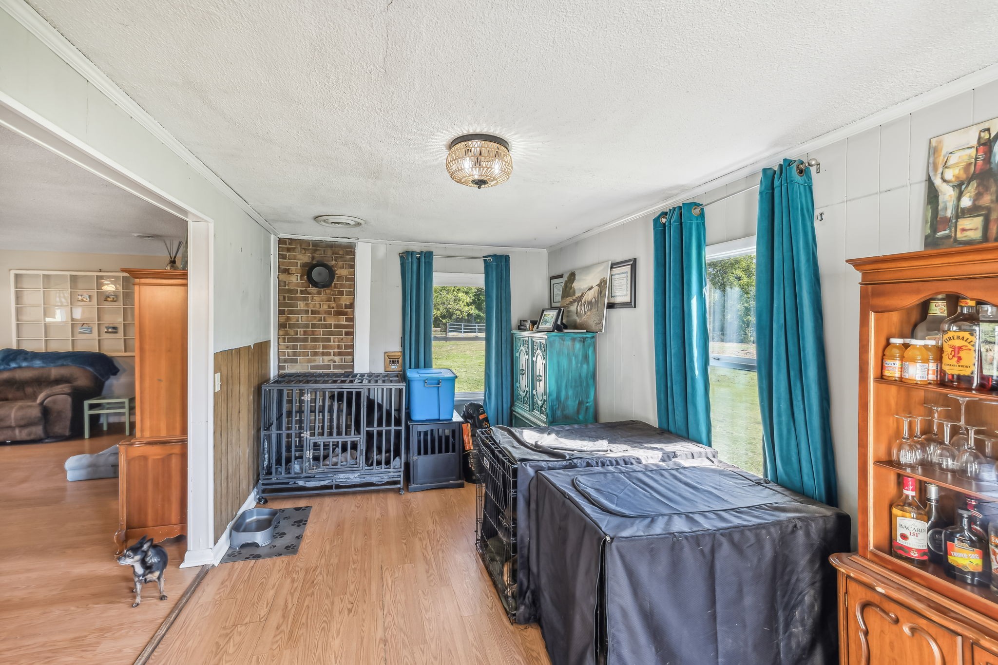 3016 Pocahontas Road Morrison, TN 37357 - Photo 25 of 47 a bed room with furniture and a floor to ceiling window