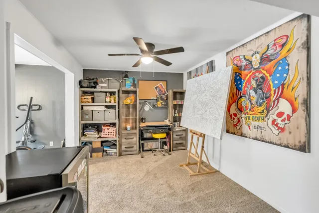 a view of a livingroom with furniture and garage