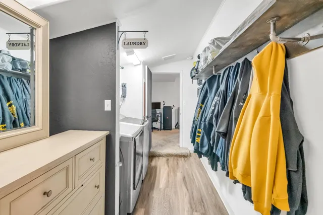 a utility room with washer and dryer