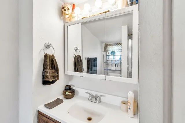 a kitchen with a stove and a cabinets