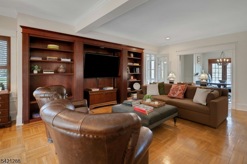 17 Briarcliff Road Mountain Lakes, NJ 07046 - Photo 12 of 50 a living room with furniture and a flat screen tv