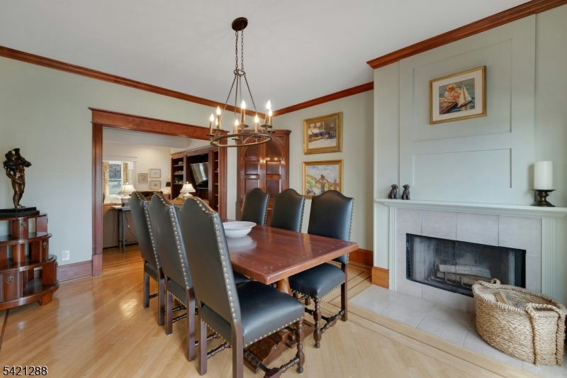 17 Briarcliff Road Mountain Lakes, NJ 07046 - Photo 17 of 50 a view of a dining room with furniture and chandelier
