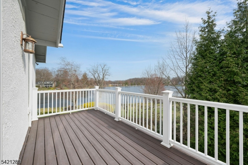 17 Briarcliff Road Mountain Lakes, NJ 07046 - Photo 31 of 50 a view of balcony with wooden floor and fence