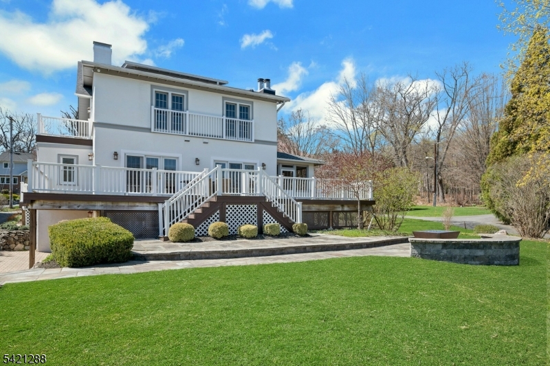 17 Briarcliff Road Mountain Lakes, NJ 07046 - Photo 43 of 50 a house view with sitting space garden view with a sitting space