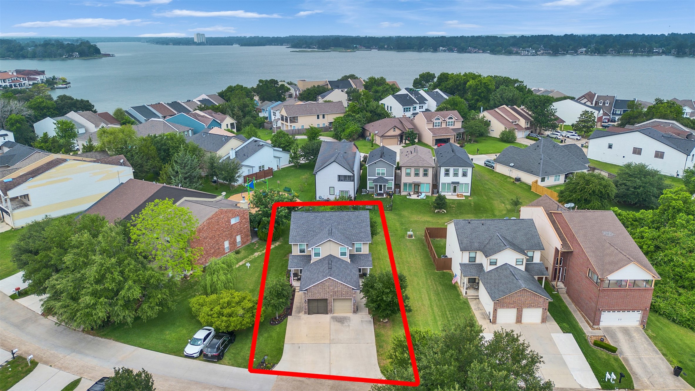278 Capetown Montgomery, TX 77356 - Photo 1 of 27 an aerial view of a city with lake view