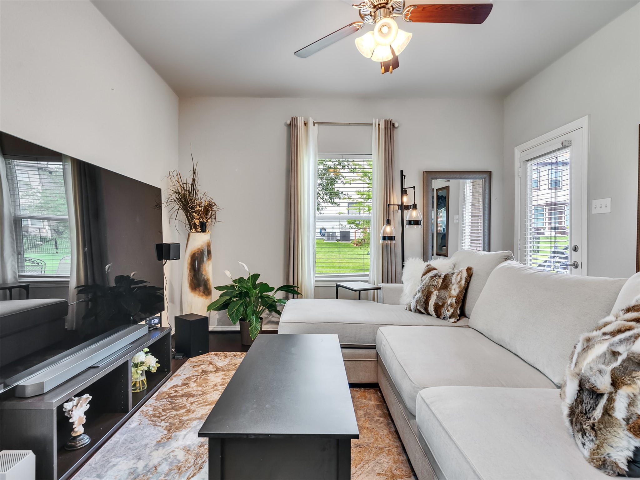 278 Capetown Montgomery, TX 77356 - Photo 14 of 27 a living room with furniture and a flat screen tv