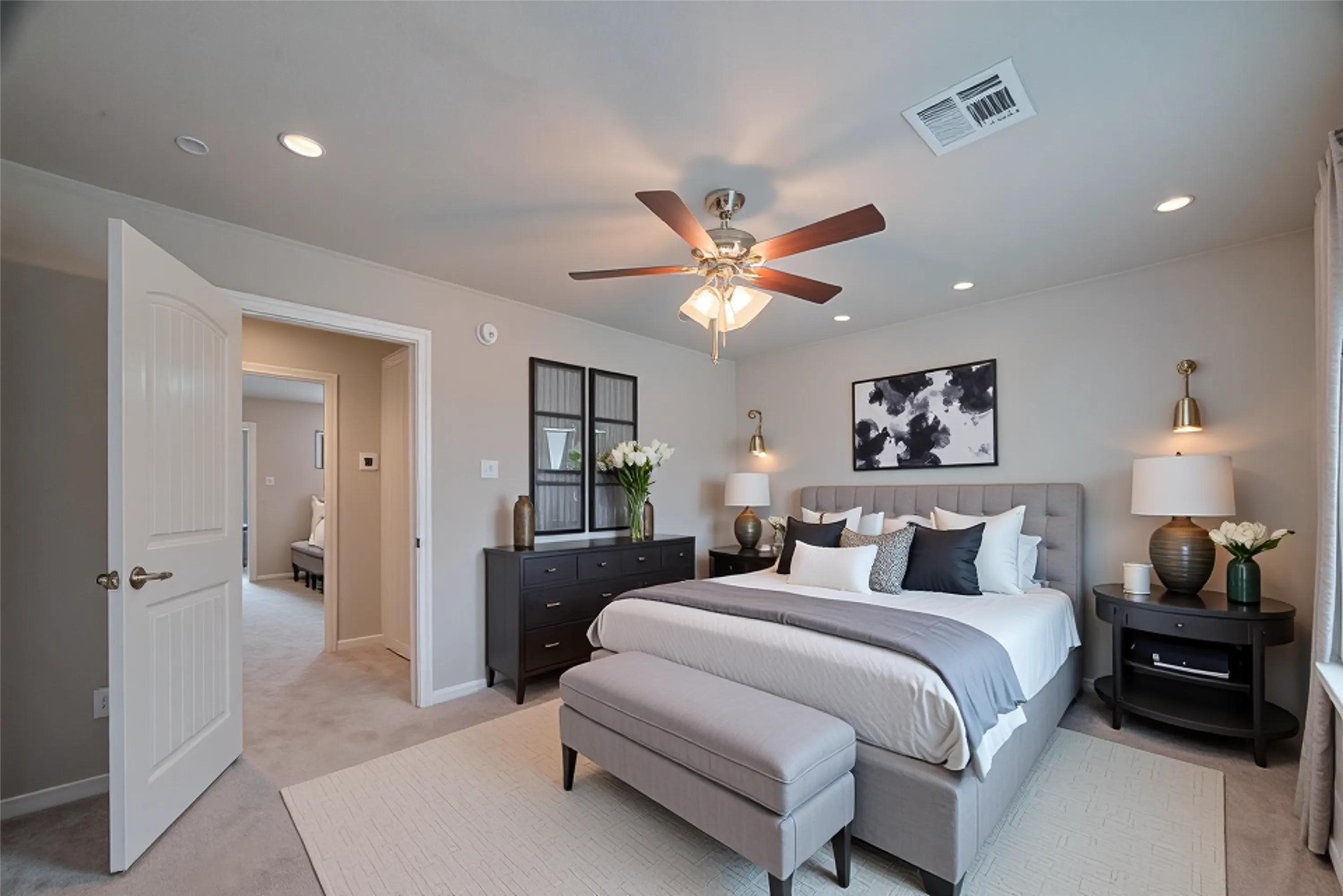 278 Capetown Montgomery, TX 77356 - Photo 20 of 27 a bedroom with a bed and a chandelier