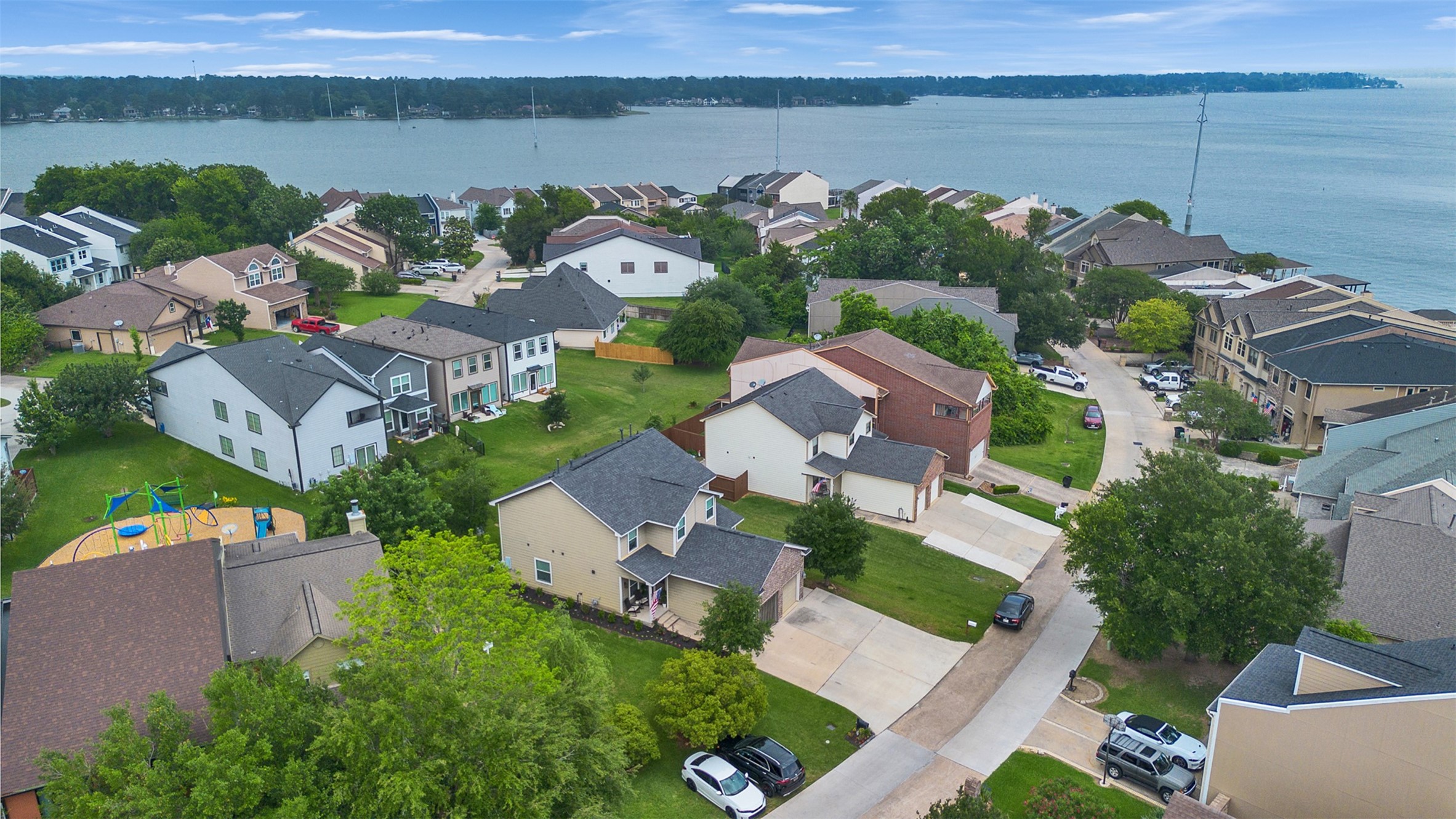 278 Capetown Montgomery, TX 77356 - Photo 3 of 27 an aerial view of a house with a lake view