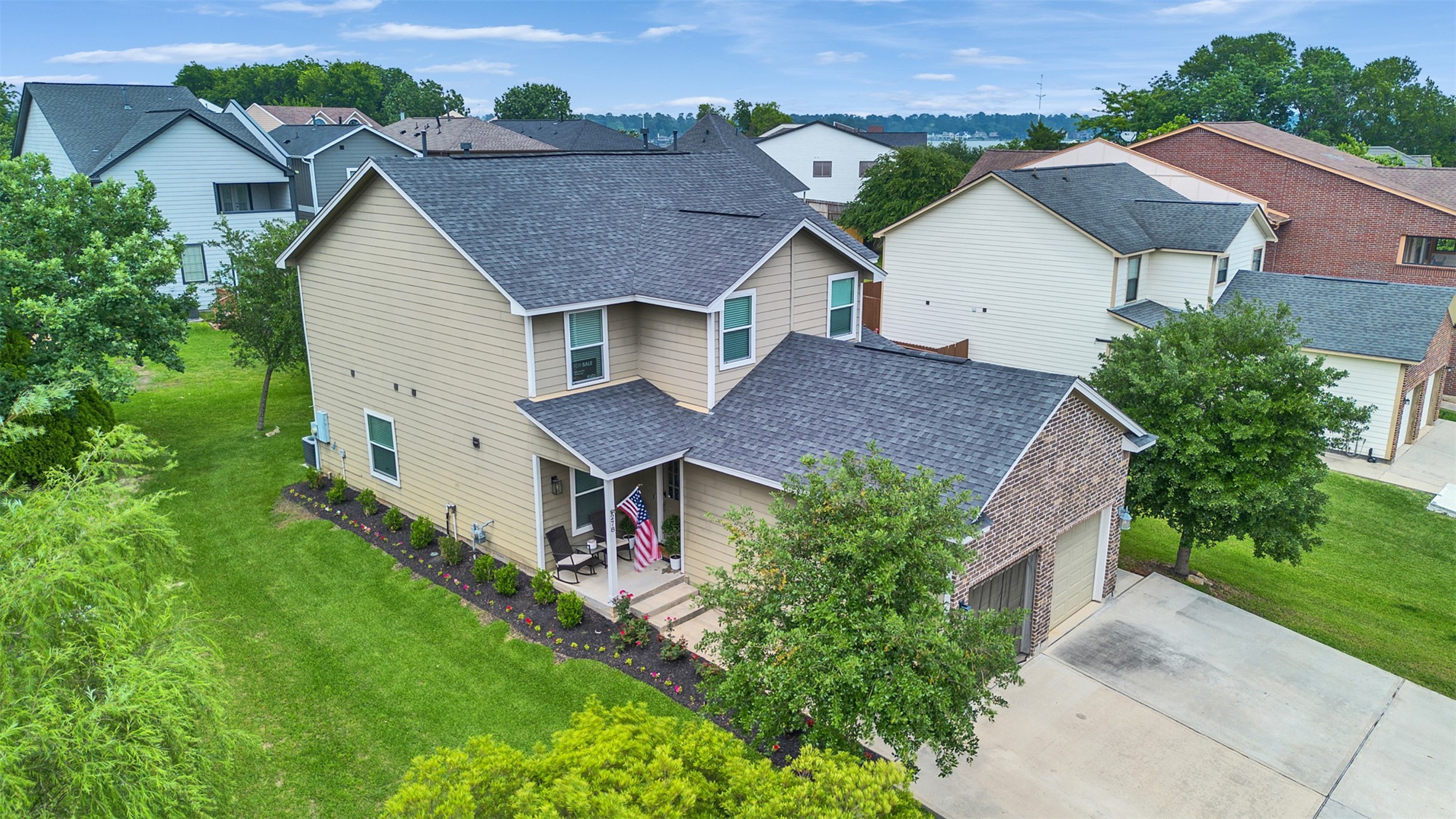 278 Capetown Montgomery, TX 77356 - Photo 5 of 27 an aerial view of a house with yard and outdoor seating