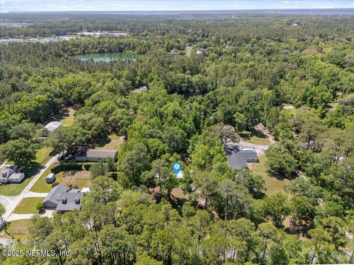 798 Worth Road St. Johns, FL 32259 - Photo 9 of 13 an aerial view of residential houses with outdoor space and trees