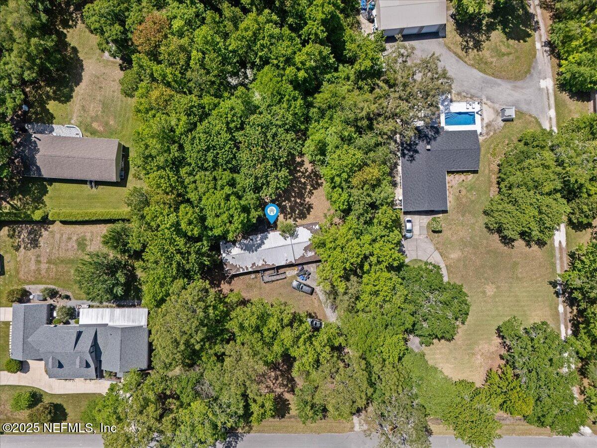798 Worth Road St. Johns, FL 32259 - Photo 10 of 13 an aerial view of a house with a yard and lake view