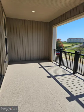 a view of balcony with furniture