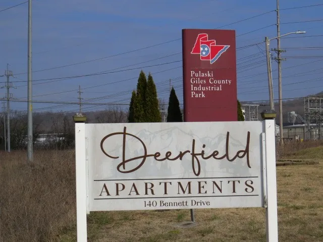 a sign that is on the side of a building