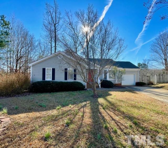 7905 Westfall Lane Raleigh, NC 27612 - Photo 1 of 42 a view of a yard in front of a house