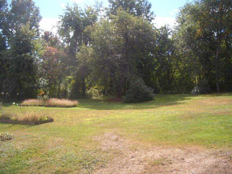 412 Main Street Waterville, ME 04901 - Photo 4 of 25 Yard/Garden. Backyard has raised...