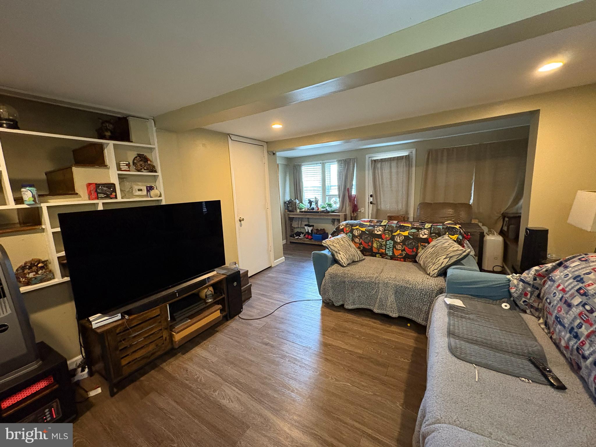 215 Erial Road Pine Hill, NJ 08021 - Photo 11 of 14 a living room with furniture and a flat screen tv