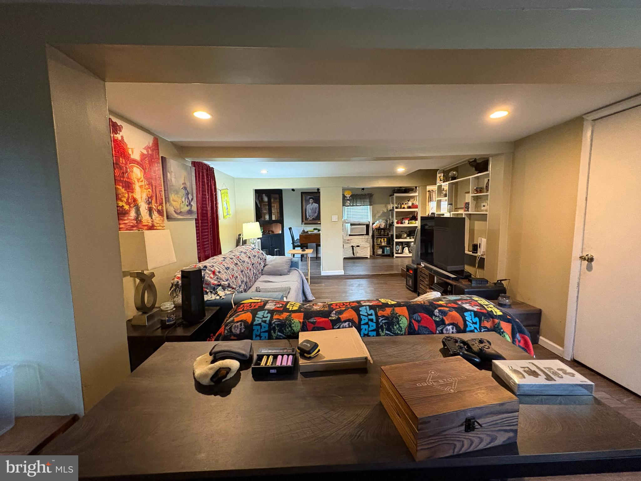 215 Erial Road Pine Hill, NJ 08021 - Photo 12 of 14 a room with furniture and a flat screen tv