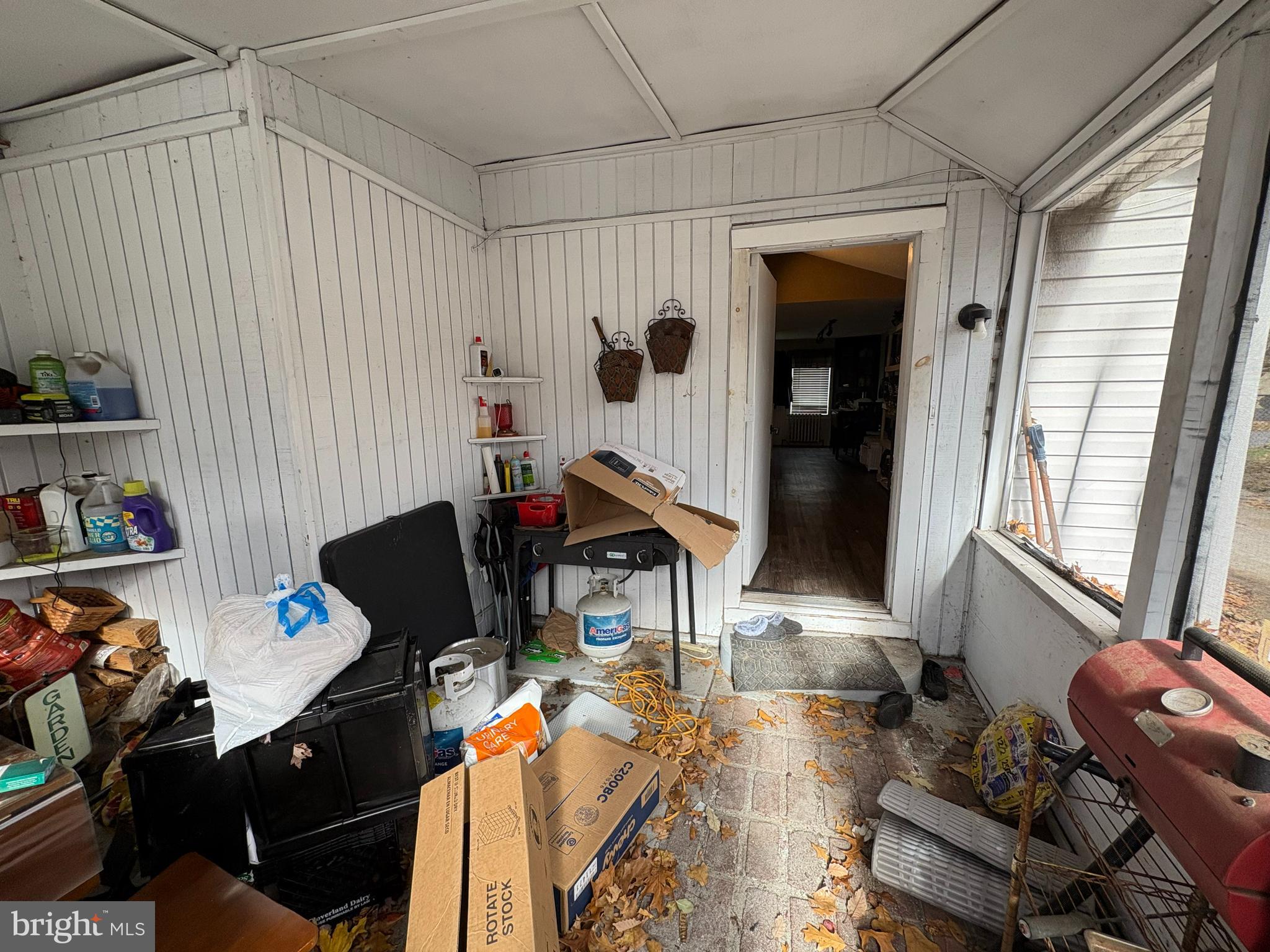 215 Erial Road Pine Hill, NJ 08021 - Photo 6 of 14 a living room with furniture a rug and a window