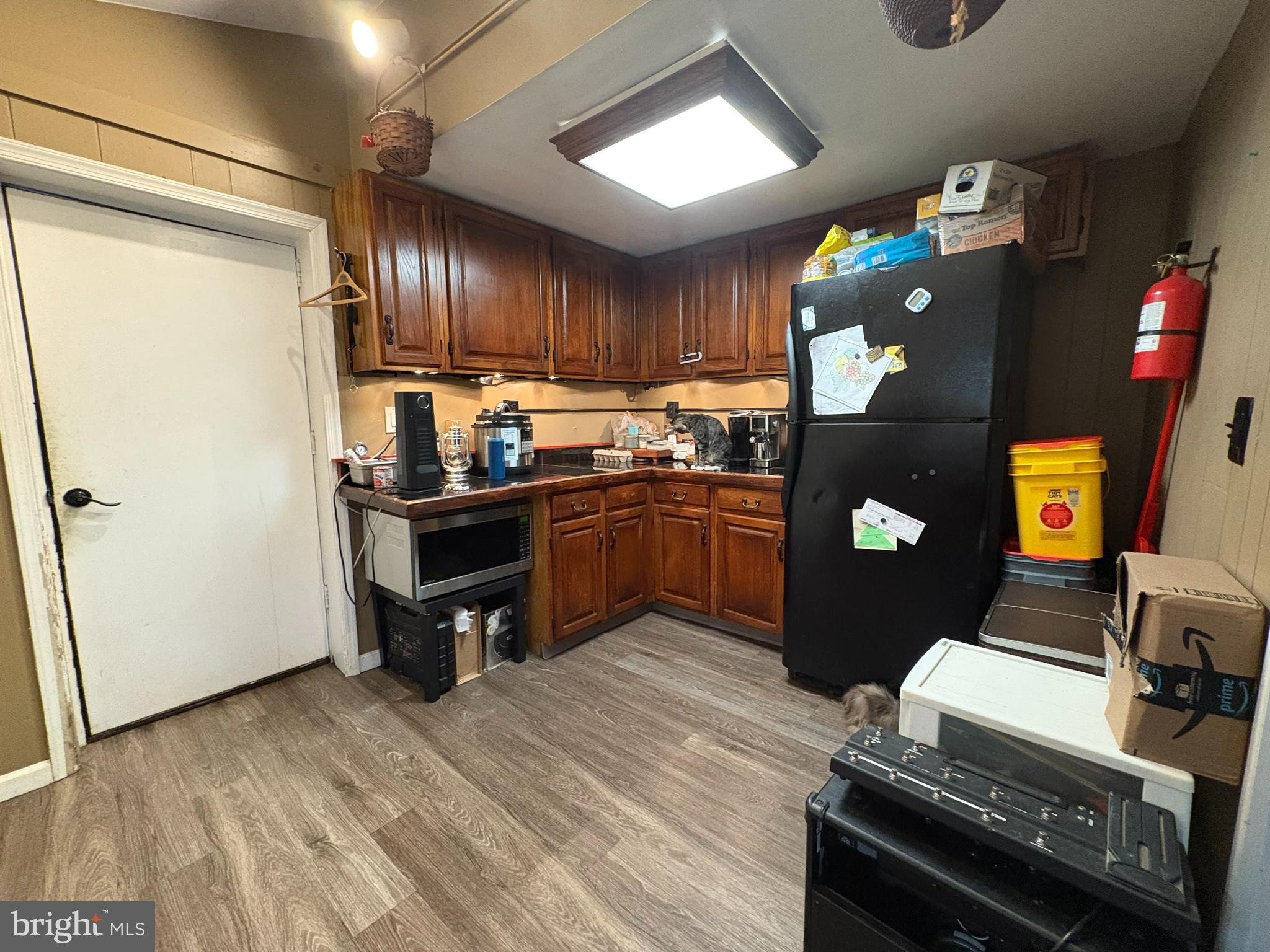 215 Erial Road Pine Hill, NJ 08021 - Photo 8 of 14 a kitchen with a sink appliances and cabinets