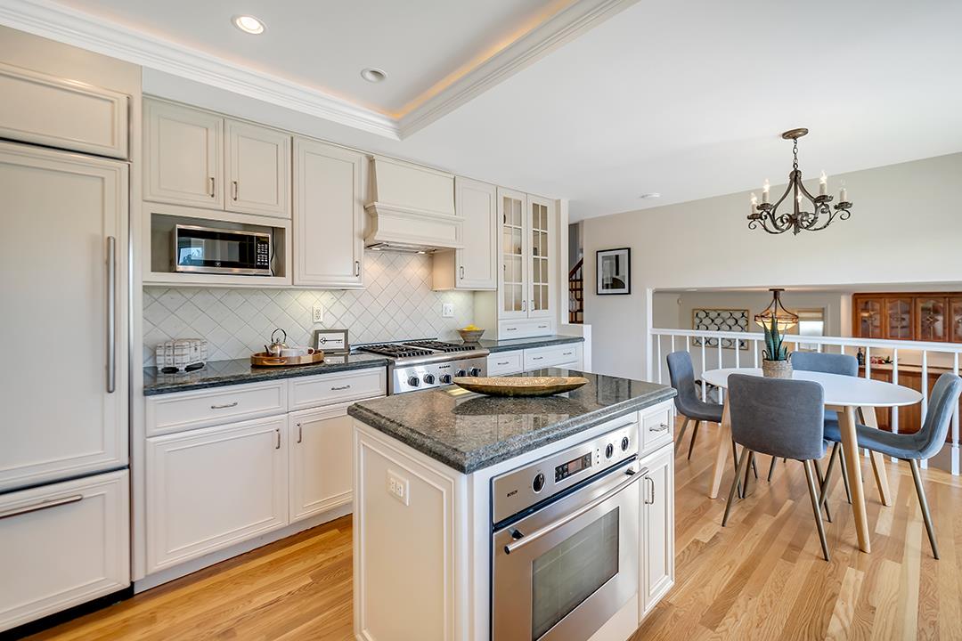 1049 Springfield Drive Millbrae, CA 94030 - Photo 13 of 51 a kitchen with a stove a sink and a refrigerator