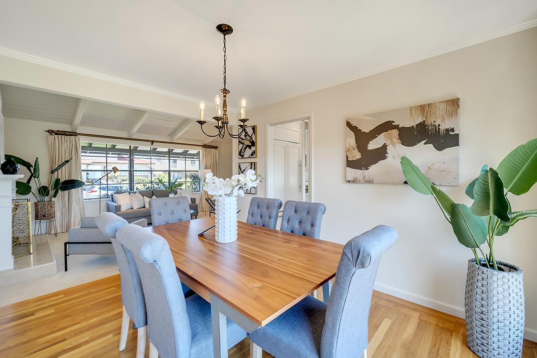 1049 Springfield Drive Millbrae, CA 94030 - Photo 17 of 51 a view of a dining room with furniture window and wooden floor