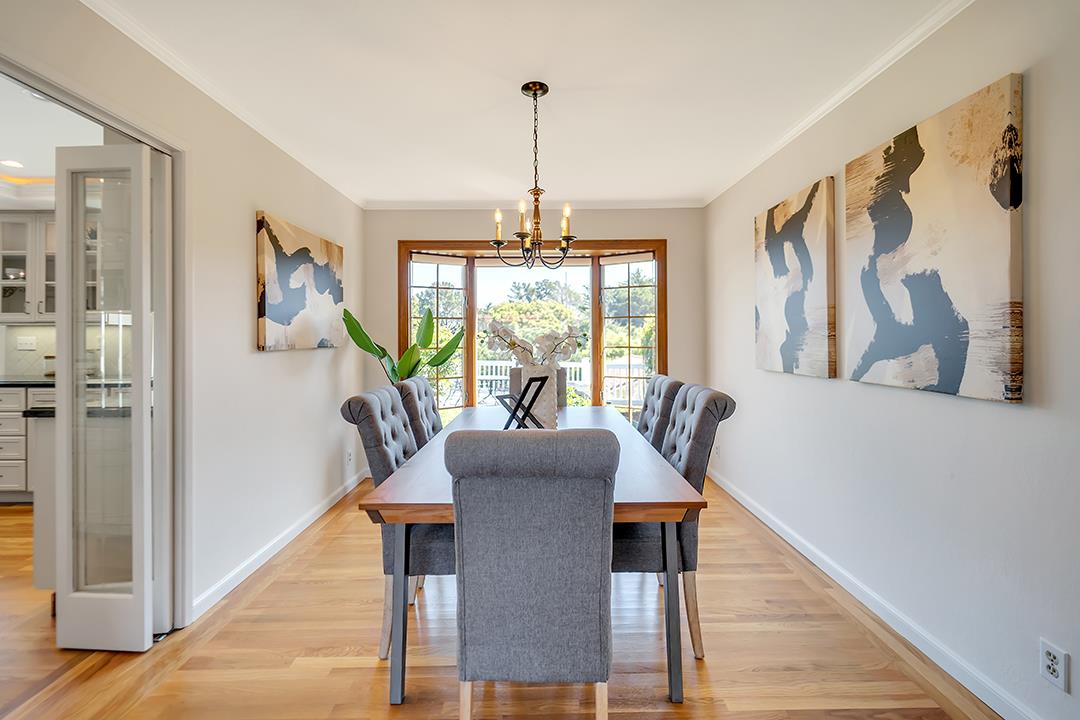 1049 Springfield Drive Millbrae, CA 94030 - Photo 18 of 51 a view of a dining room with furniture window and wooden floor