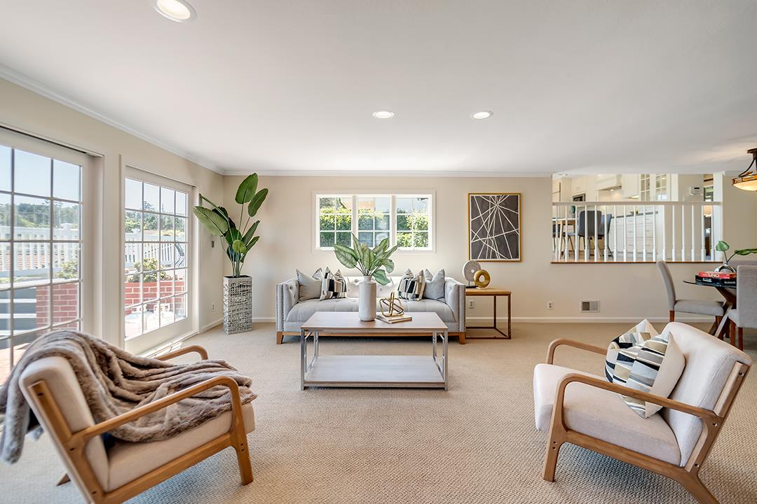 1049 Springfield Drive Millbrae, CA 94030 - Photo 20 of 51 a living room with furniture and a floor to ceiling window