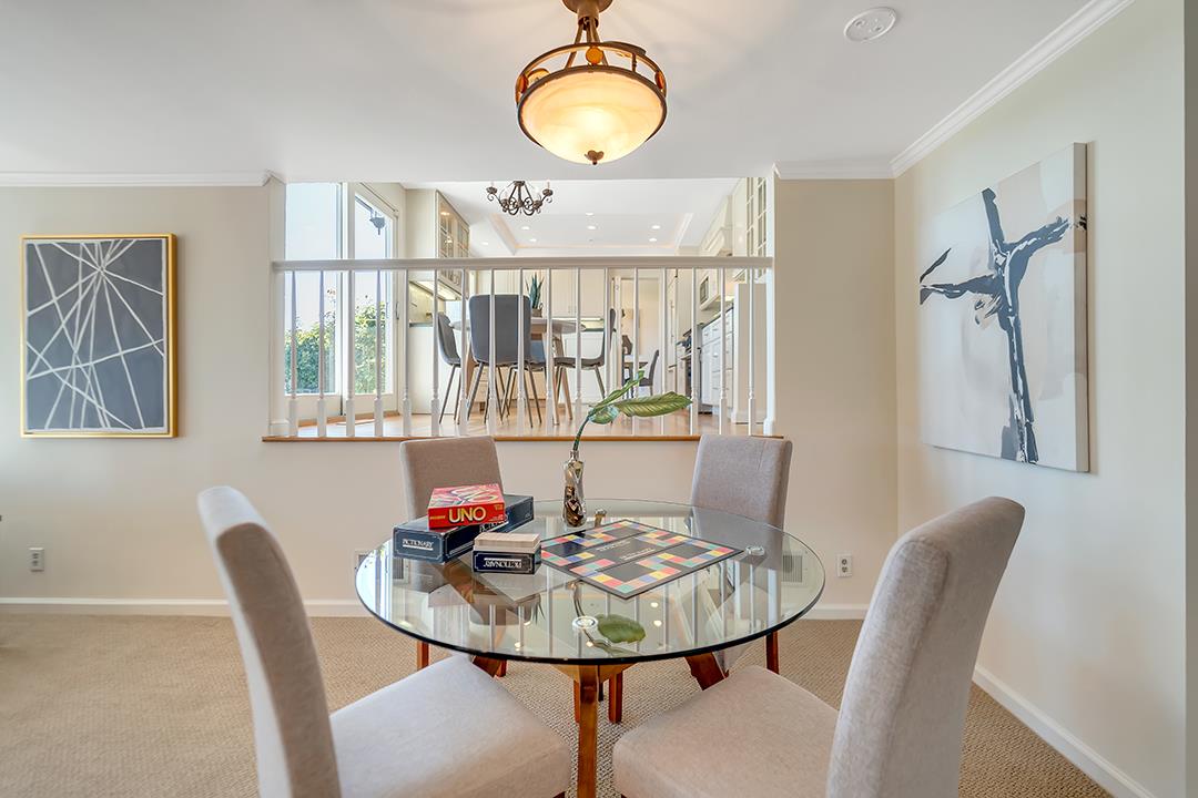 1049 Springfield Drive Millbrae, CA 94030 - Photo 22 of 51 a view of a dining room with furniture window and wooden floor