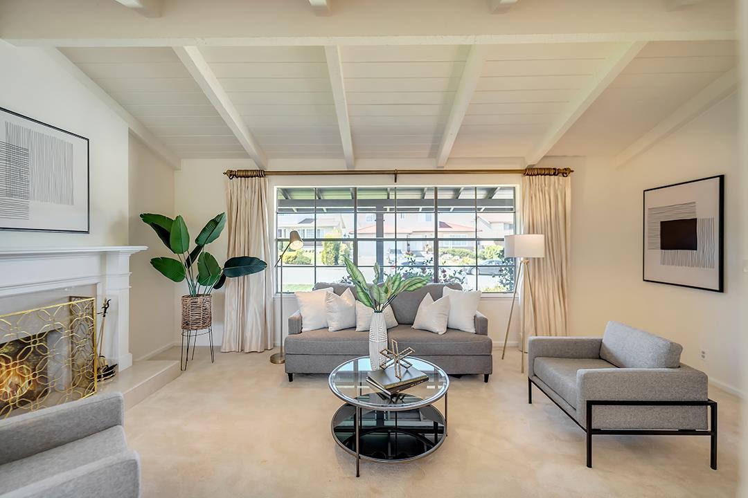 1049 Springfield Drive Millbrae, CA 94030 - Photo 10 of 51 a living room with furniture and a large window