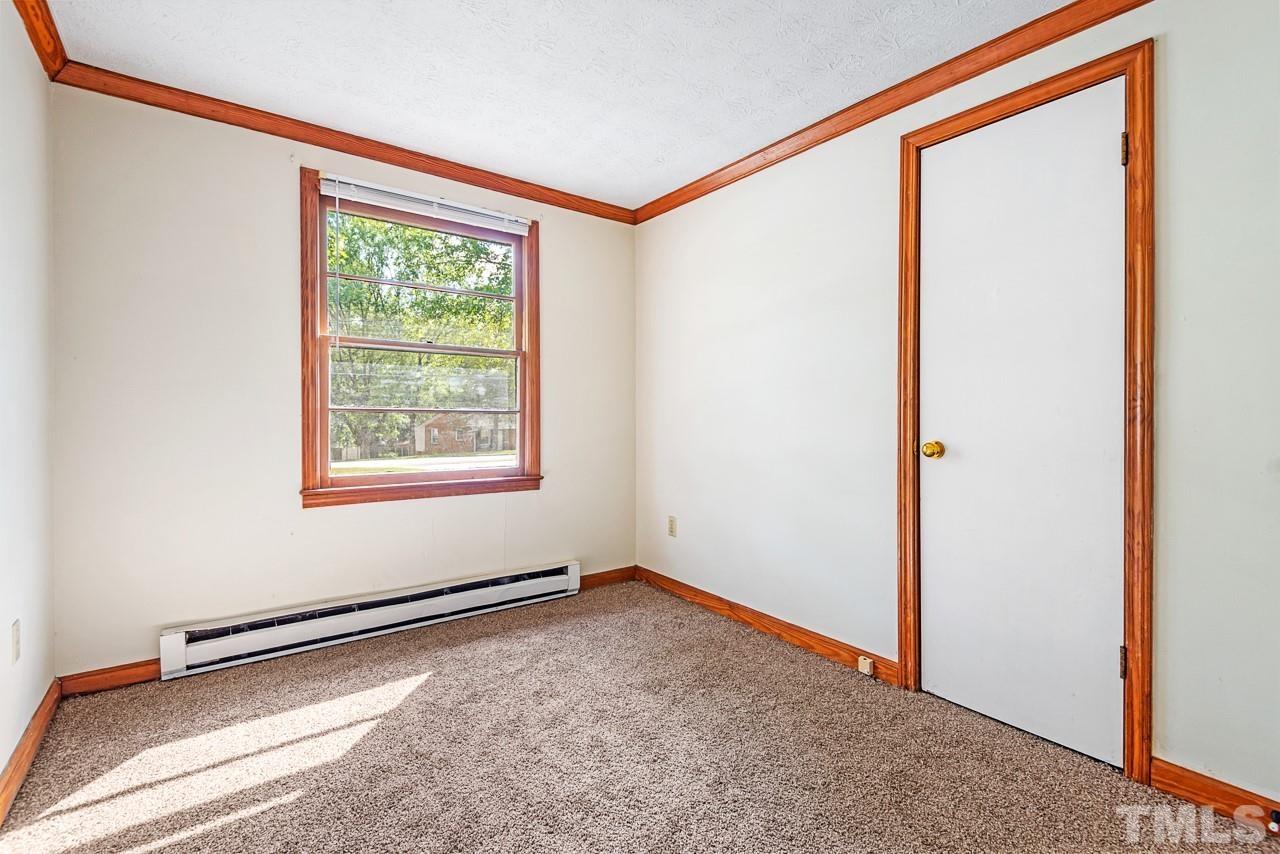 3014 Dearborn Drive Durham, NC 27704 - Photo 13 of 30 an empty room with a window