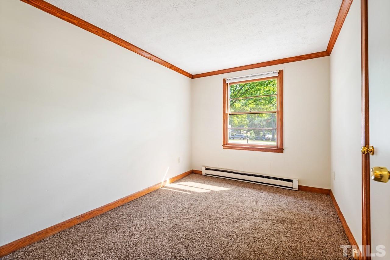 3014 Dearborn Drive Durham, NC 27704 - Photo 14 of 30 a view of an empty room with a window