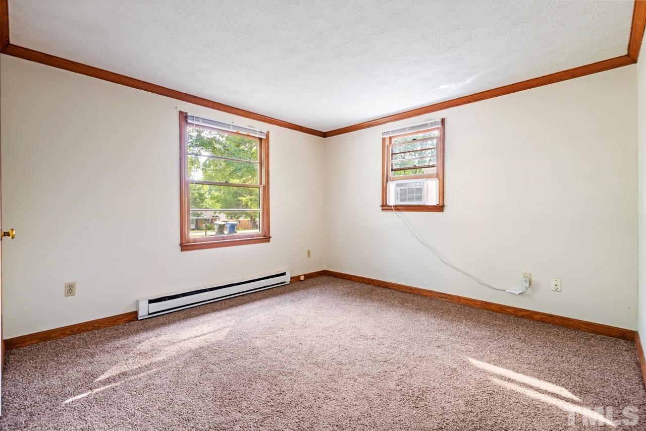 3014 Dearborn Drive Durham, NC 27704 - Photo 17 of 30 an empty room with windows