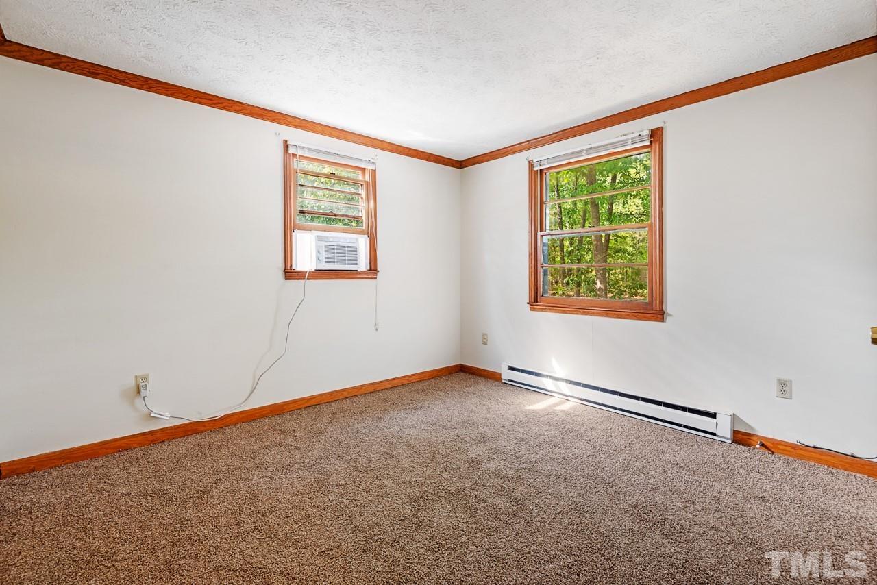 3014 Dearborn Drive Durham, NC 27704 - Photo 19 of 30 an empty room with windows