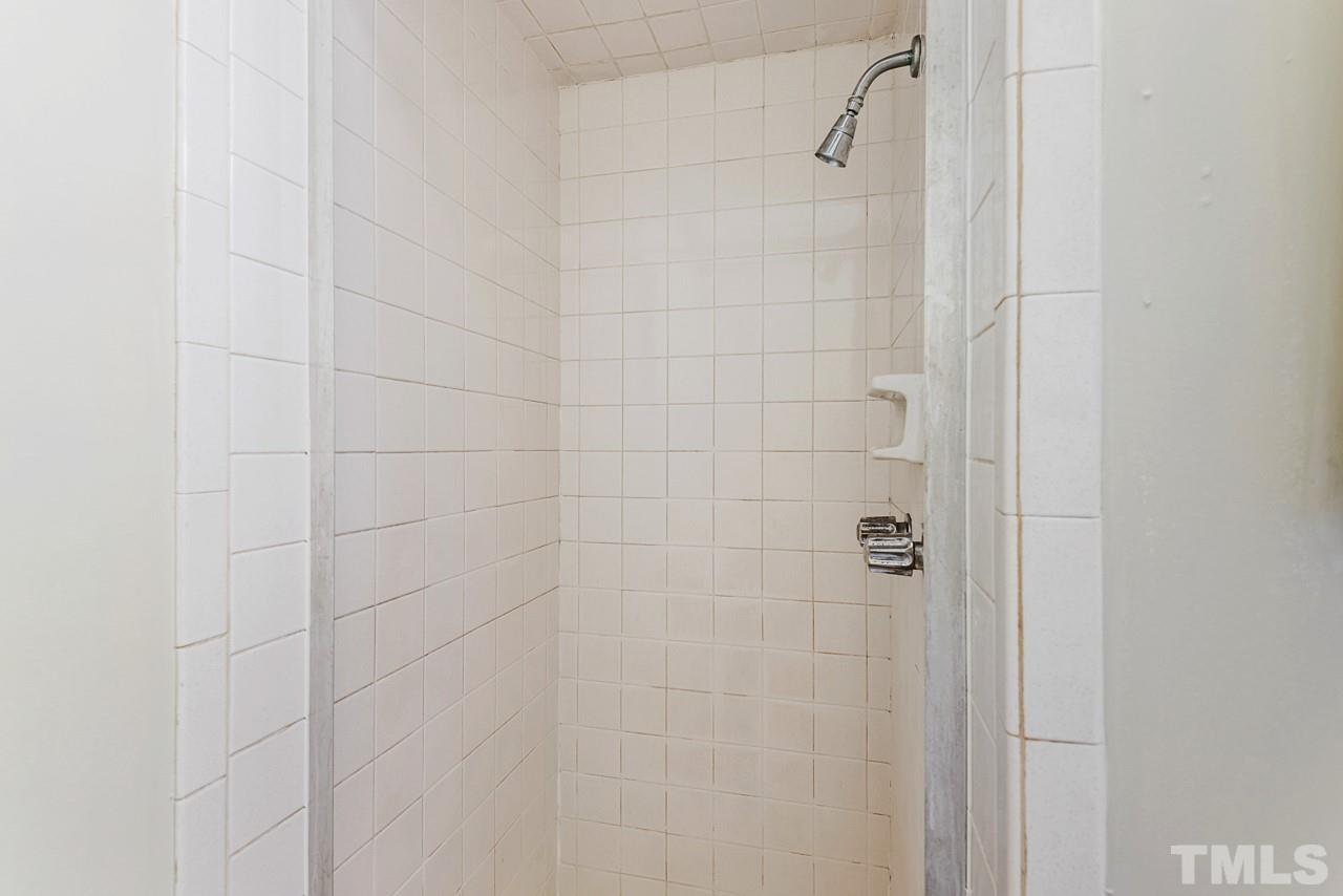 3014 Dearborn Drive Durham, NC 27704 - Photo 21 of 30 a bathroom with a shower