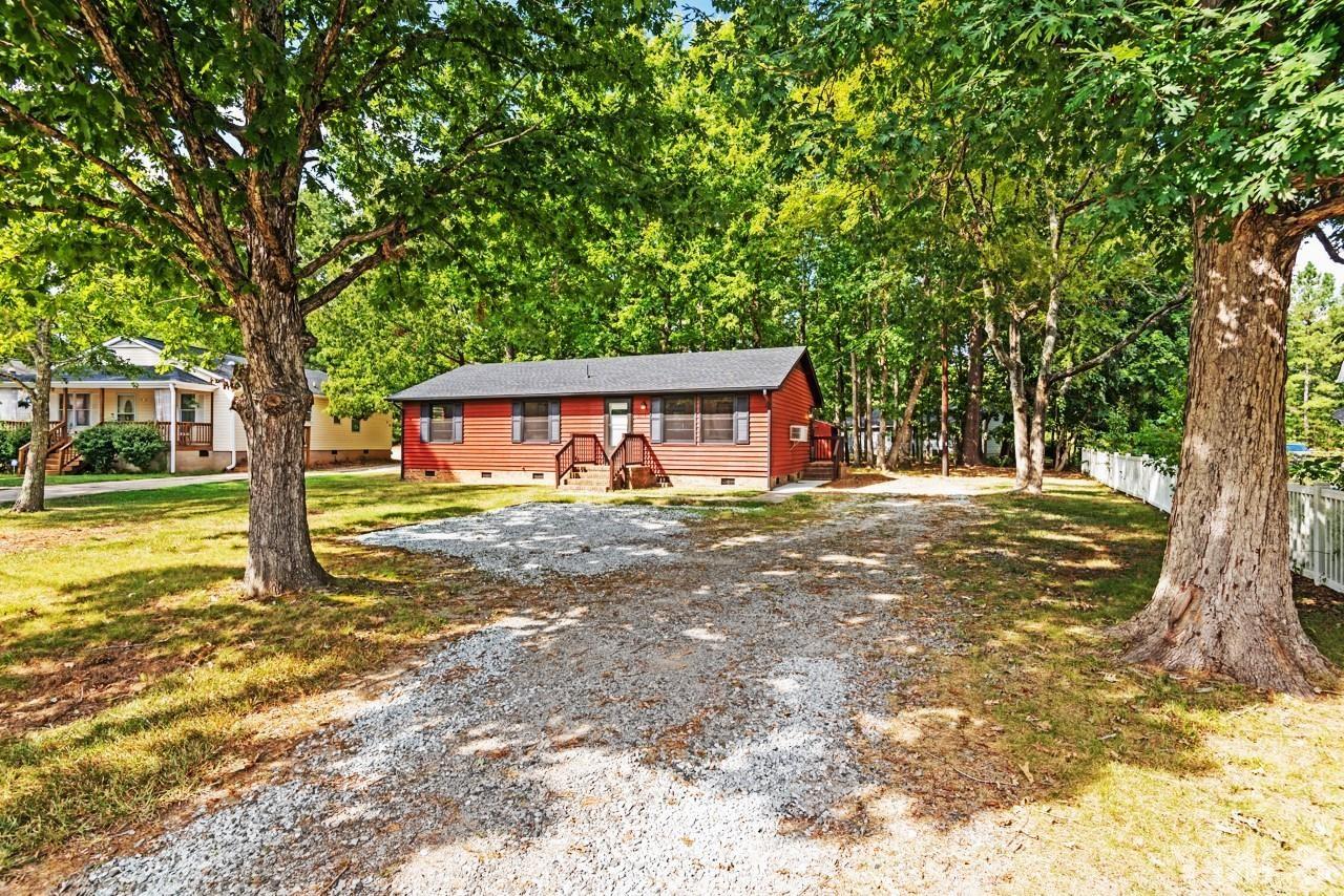 3014 Dearborn Drive Durham, NC 27704 - Photo 29 of 30 a front view of a house with a yard