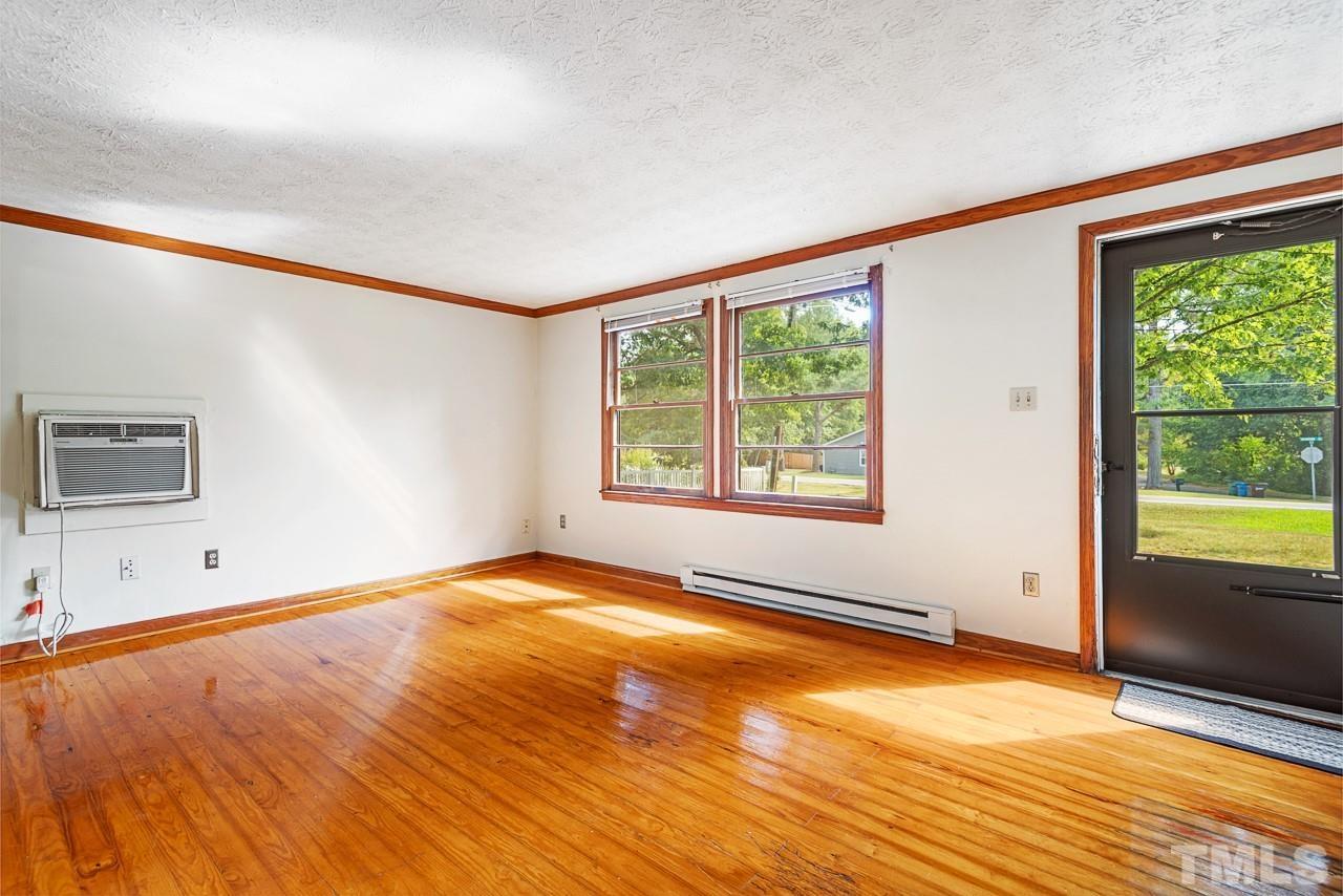 3014 Dearborn Drive Durham, NC 27704 - Photo 8 of 30 a view of an empty room with a window
