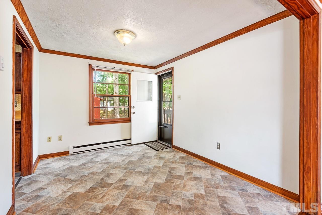 3014 Dearborn Drive Durham, NC 27704 - Photo 9 of 30 a view of an empty room with a window