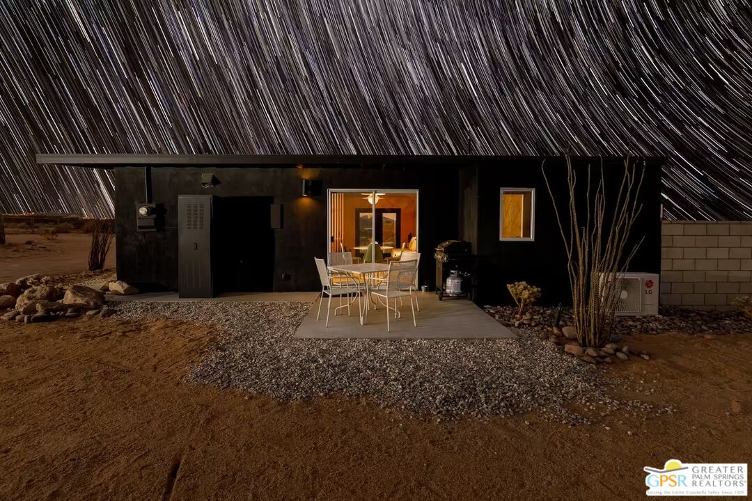 4619 Kickapoo Trail Landers, CA 92285 - Photo 2 of 55 a front view of a house with sitting area