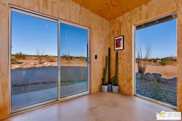 a bedroom with a bed and furniture