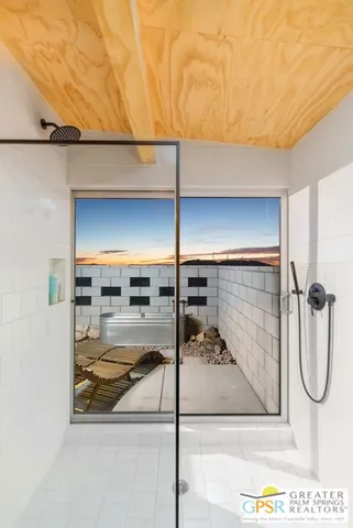 a view of a terrace with sitting area