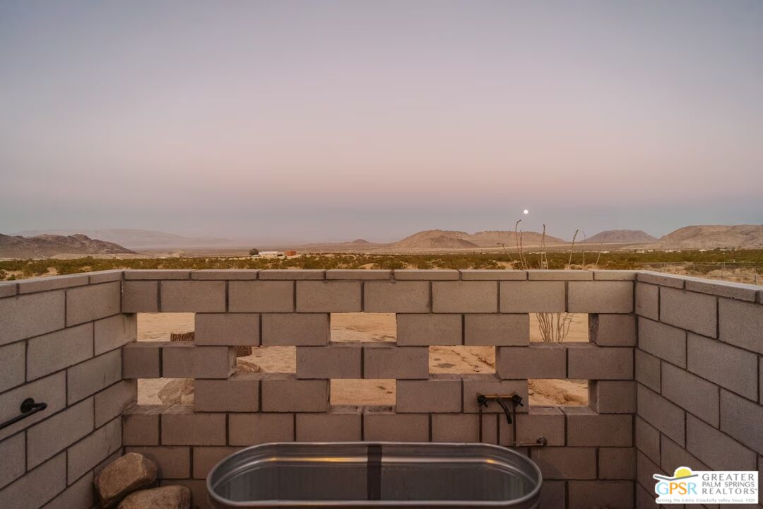 4619 Kickapoo Trail Landers, CA 92285 - Photo 29 of 55 a view of a terrace with sitting area