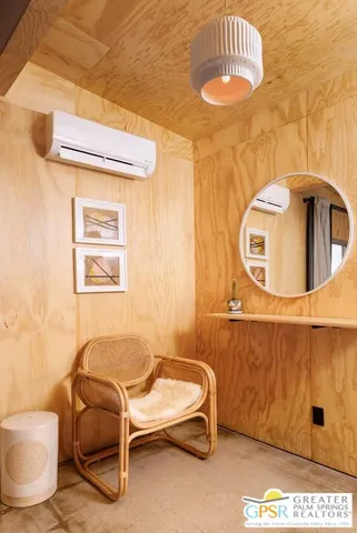 a bedroom with a bed and a table in it