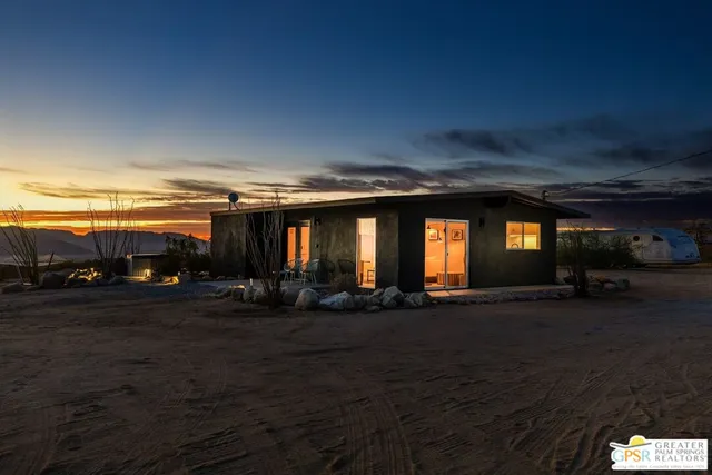 a view of a patio in backyard