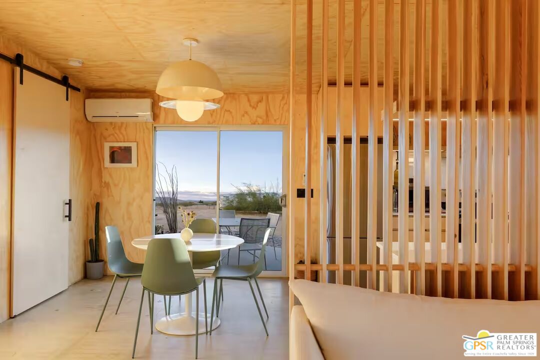 4619 Kickapoo Trail Landers, CA 92285 - Photo 41 of 55 a dining room with furniture and a window