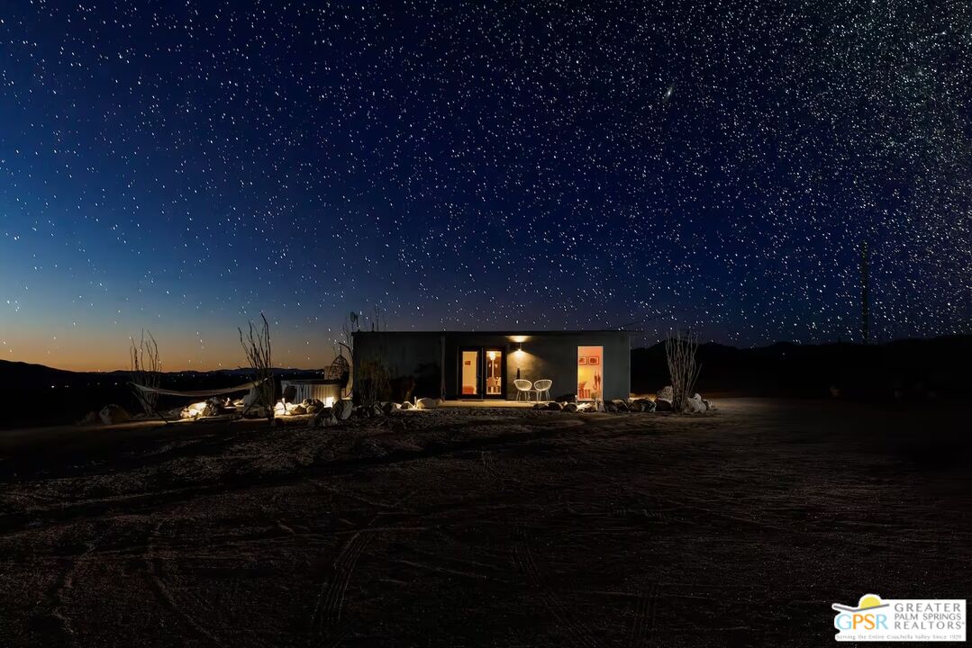 4619 Kickapoo Trail Landers, CA 92285 - Photo 47 of 55 a front view of a house with a yard