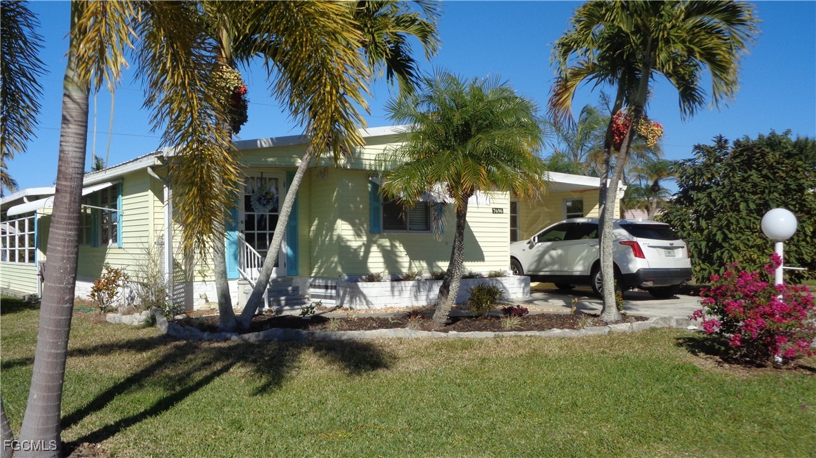 7696 Helen Road Bokeelia, FL 33922 - Photo 13 of 45 a view of a park with palm trees