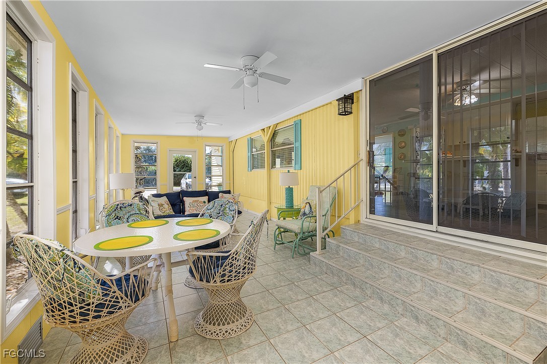 7696 Helen Road Bokeelia, FL 33922 - Photo 38 of 45 a view of a dining room with furniture