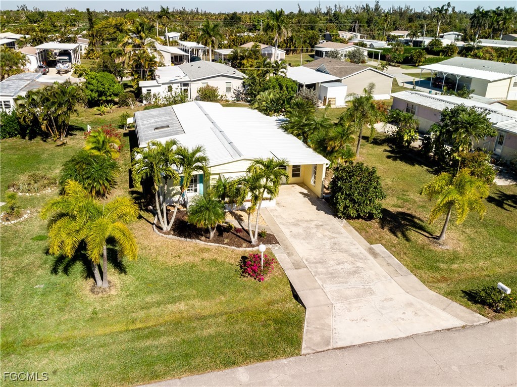 7696 Helen Road Bokeelia, FL 33922 - Photo 42 of 45 an aerial view of residential houses with outdoor space