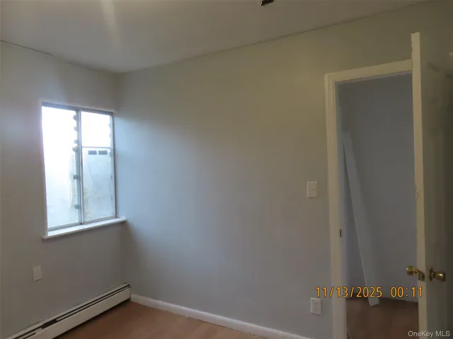 a view of an empty room and window