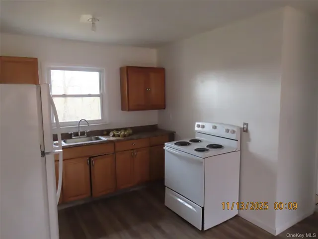 a kitchen with a stove and a microwave